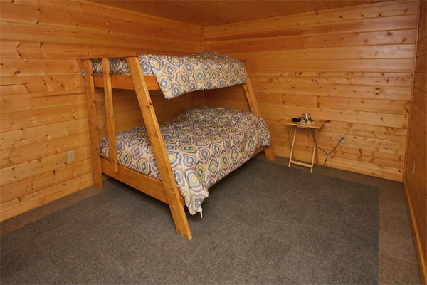 Comfortable and restful log cabin sleeping area